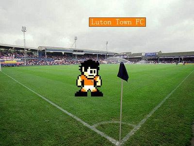 Luton Town FC Mega Man by LTFC1992
This outfit belongs to Luton Town FC.  I can't add much more than that beyond possibly knowing what the LTFC in his name stands for now.
